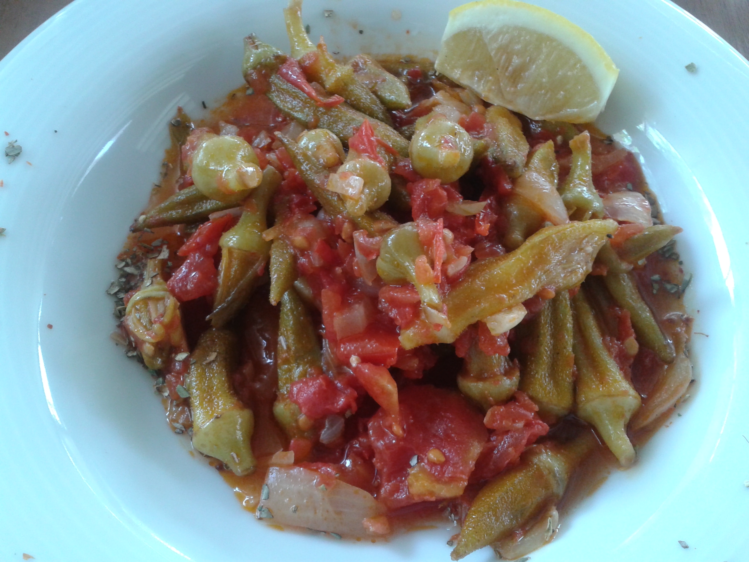 A pot of Greek bamies latheres okra in tomato sauce