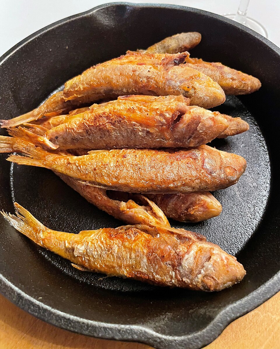 Golden fried Greek barbouni red mullet with lemon