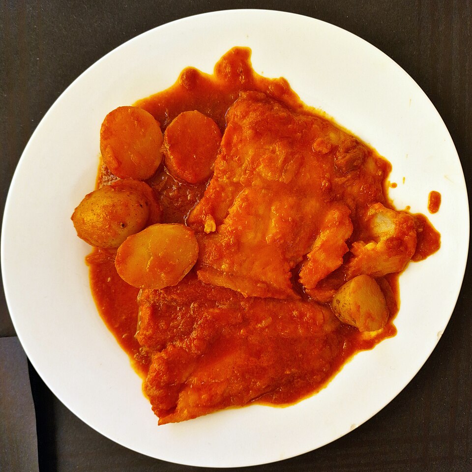 Corfu bourdeto fish stew in a bright red paprika sauce