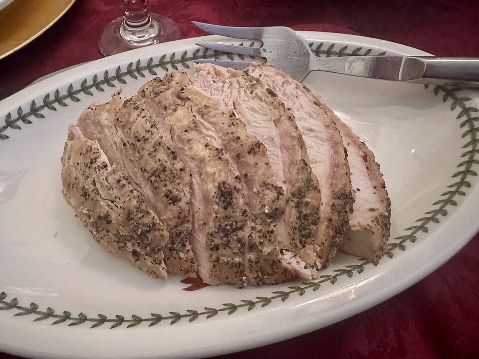 A whole roasted Greek galopoula turkey stuffed with chestnut rice filling
