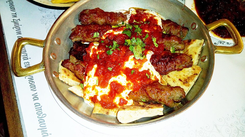 Thessaloniki giaourtlou kebab with tomato sauce and garlic yogurt