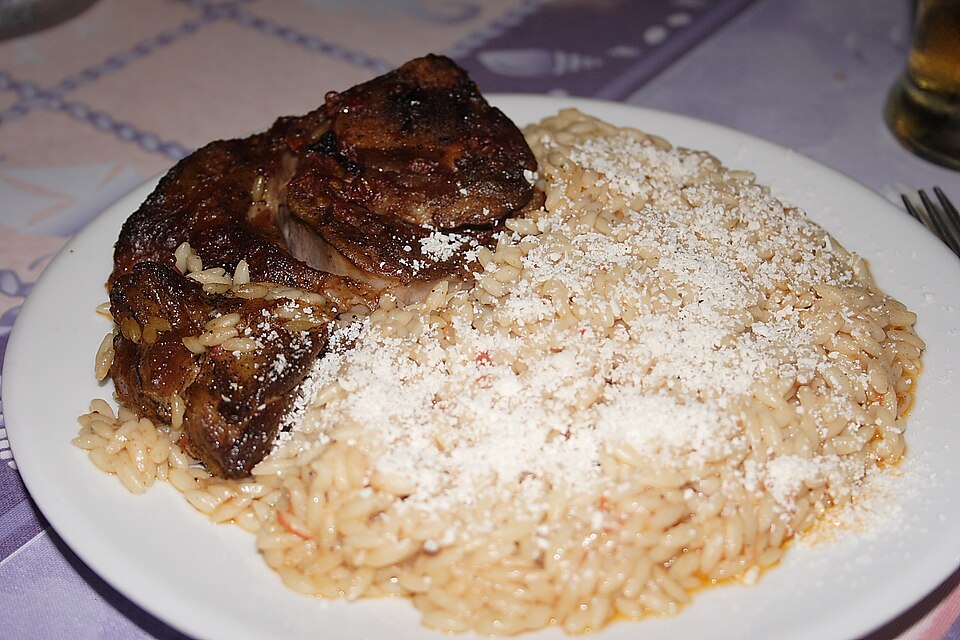 Greek giouvetsi baked beef and orzo in a clay dish