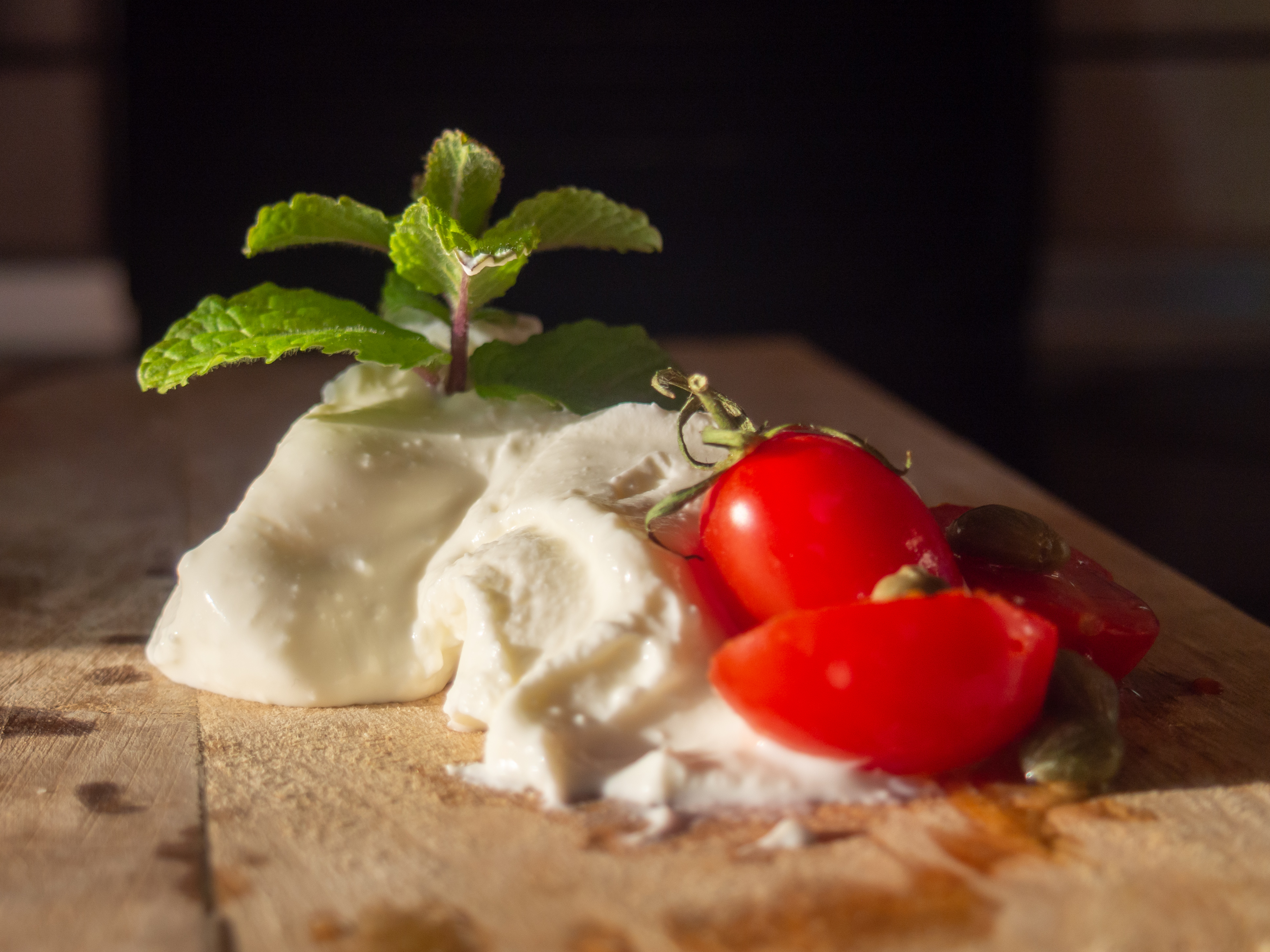 A bowl of Greek katiki Domokou soft cheese spread with olive oil