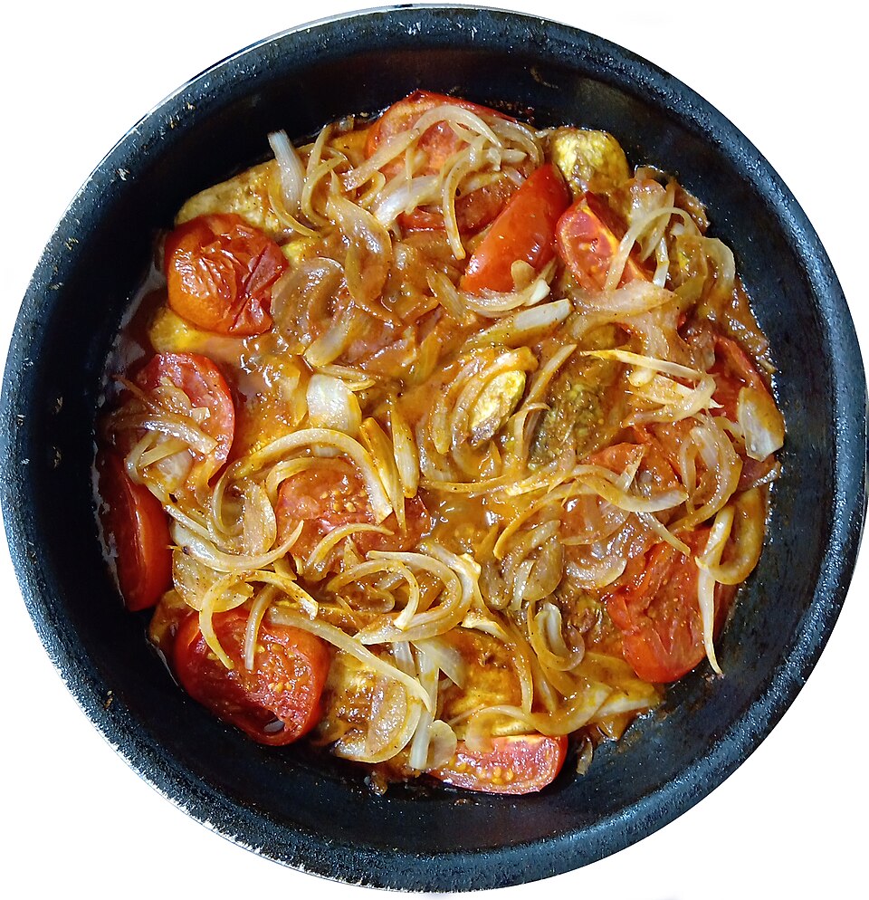 A pot of Greek kolokithakia yiahni courgette in tomato sauce