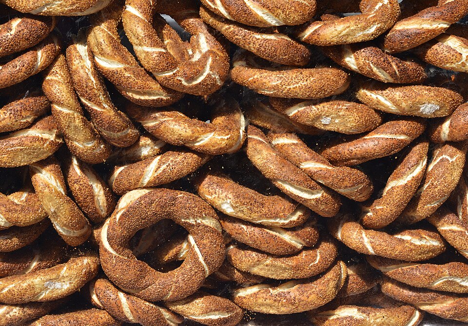 Golden koulouri Thessalonikis sesame bread rings on a tray