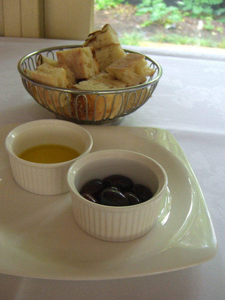 A small jug of Greek ladolemono olive oil and lemon sauce