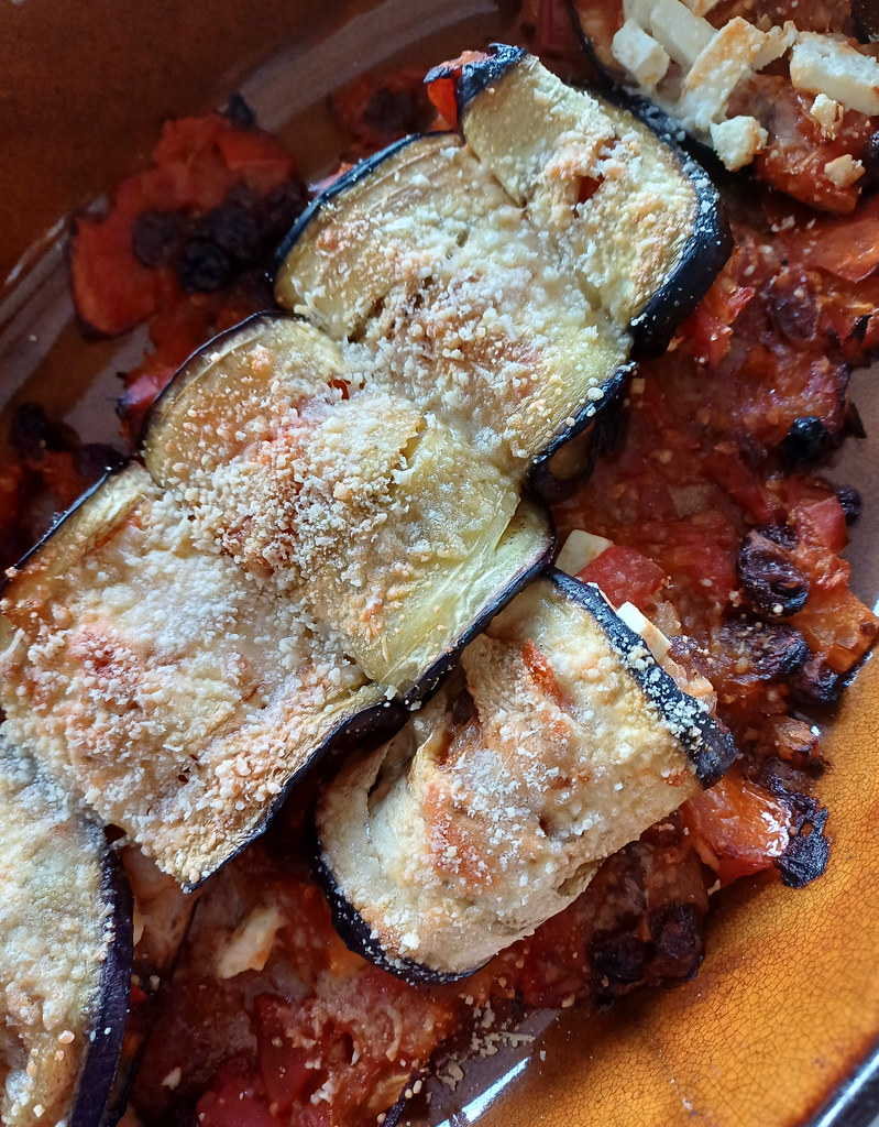 Greek melitzanes me feta baked aubergine with tomato and melted feta
