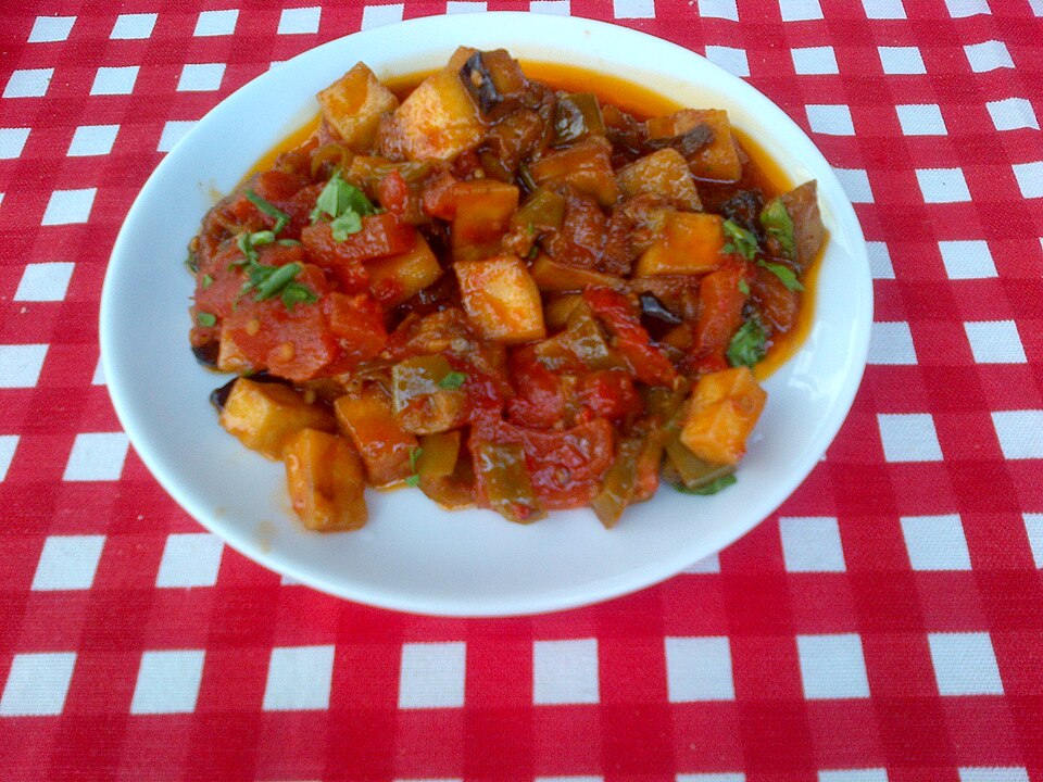A pot of Greek melitzanes yahni aubergine and tomato stew