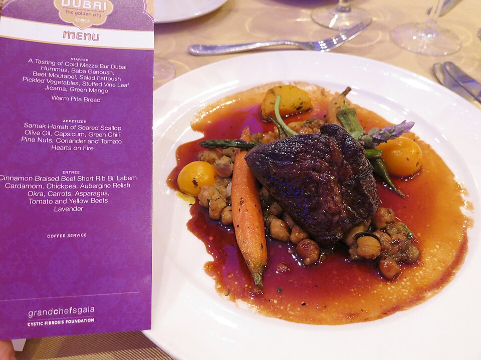 A pot of Greek moschari kokkinisto beef braised in red tomato sauce