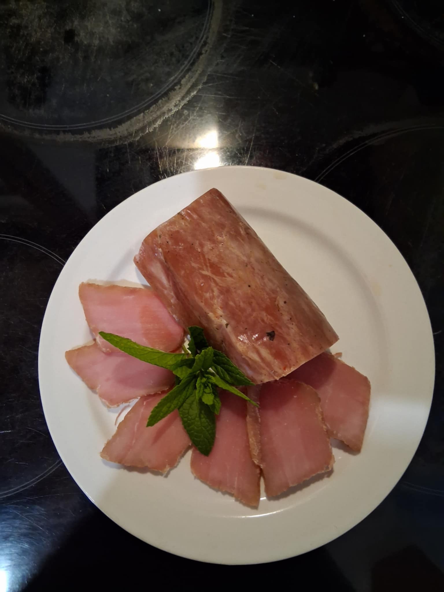 Sliced noumboulo, Corfu's smoked cured pork fillet