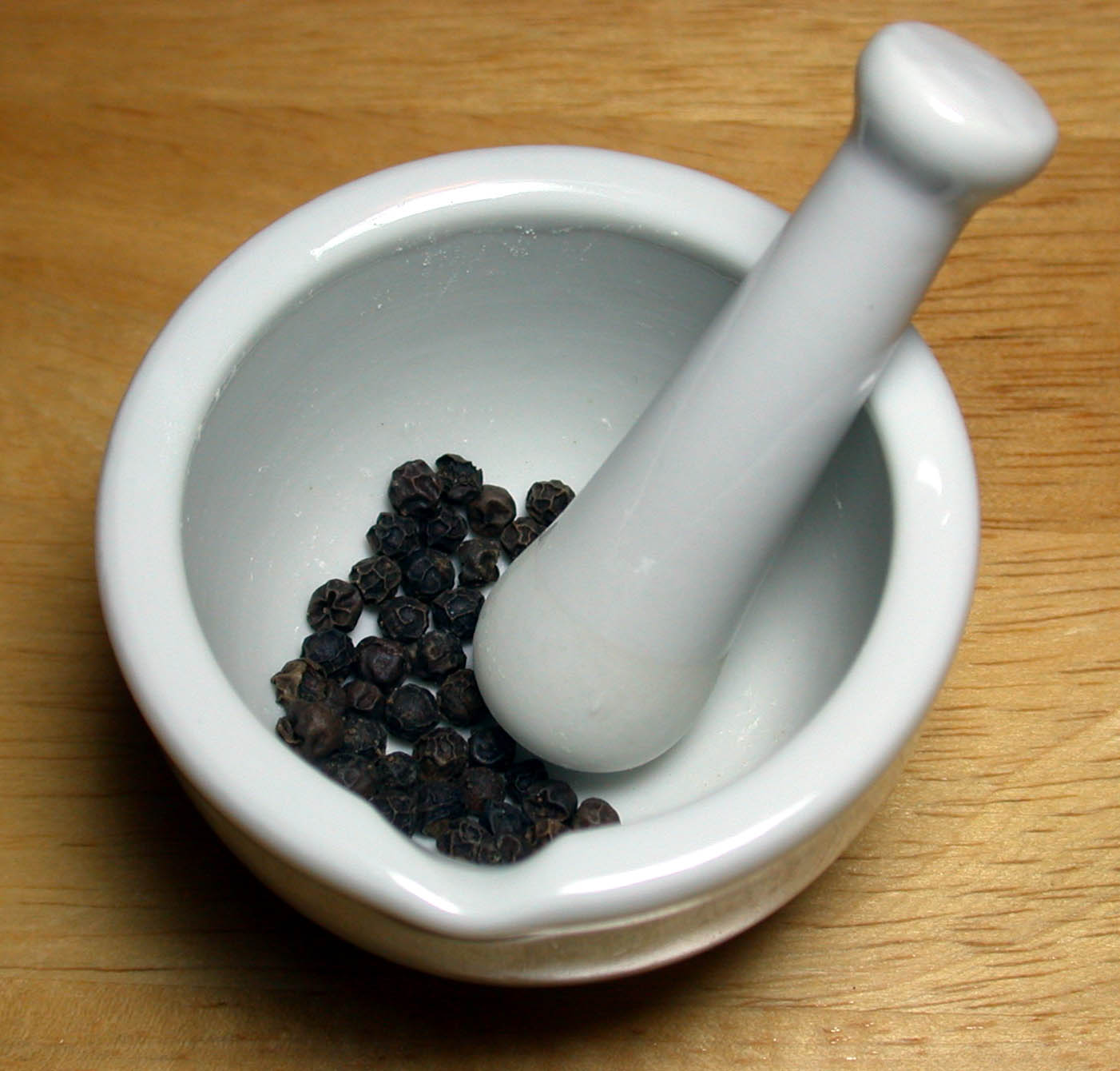 Black peppercorns, whole and freshly ground