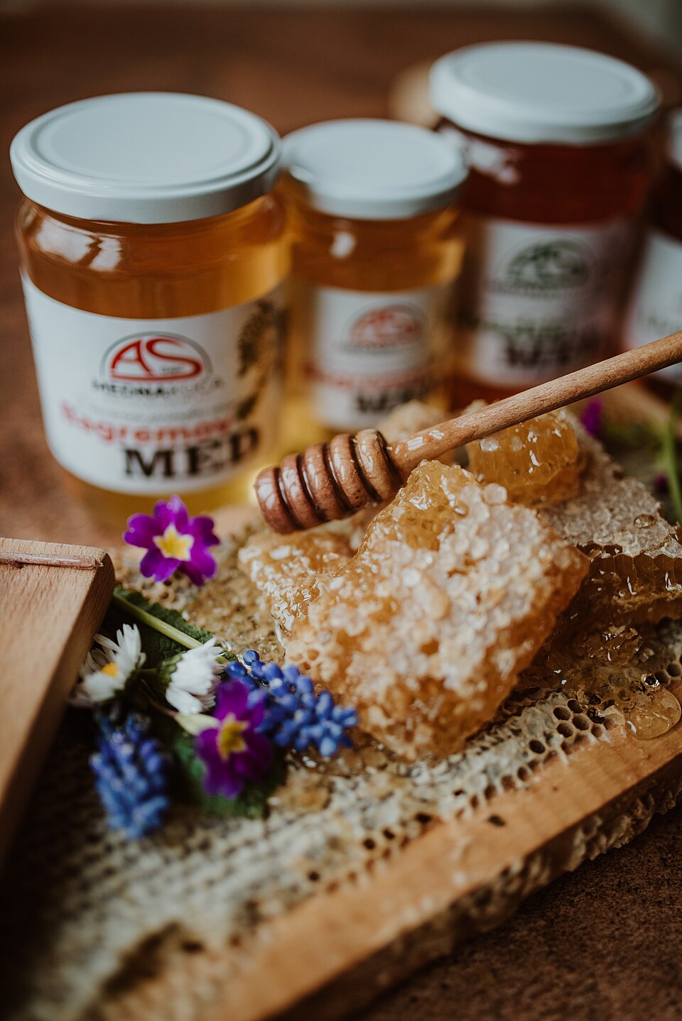 Greek thyme honey being drizzled over a dessert
