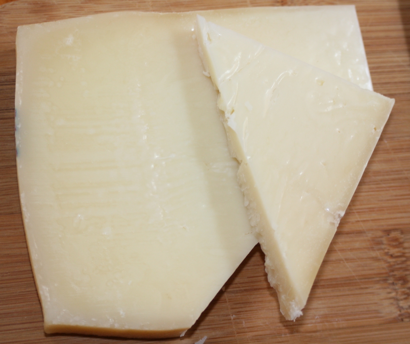 A wedge of kefalotyri, a hard salty Greek sheep-milk cheese