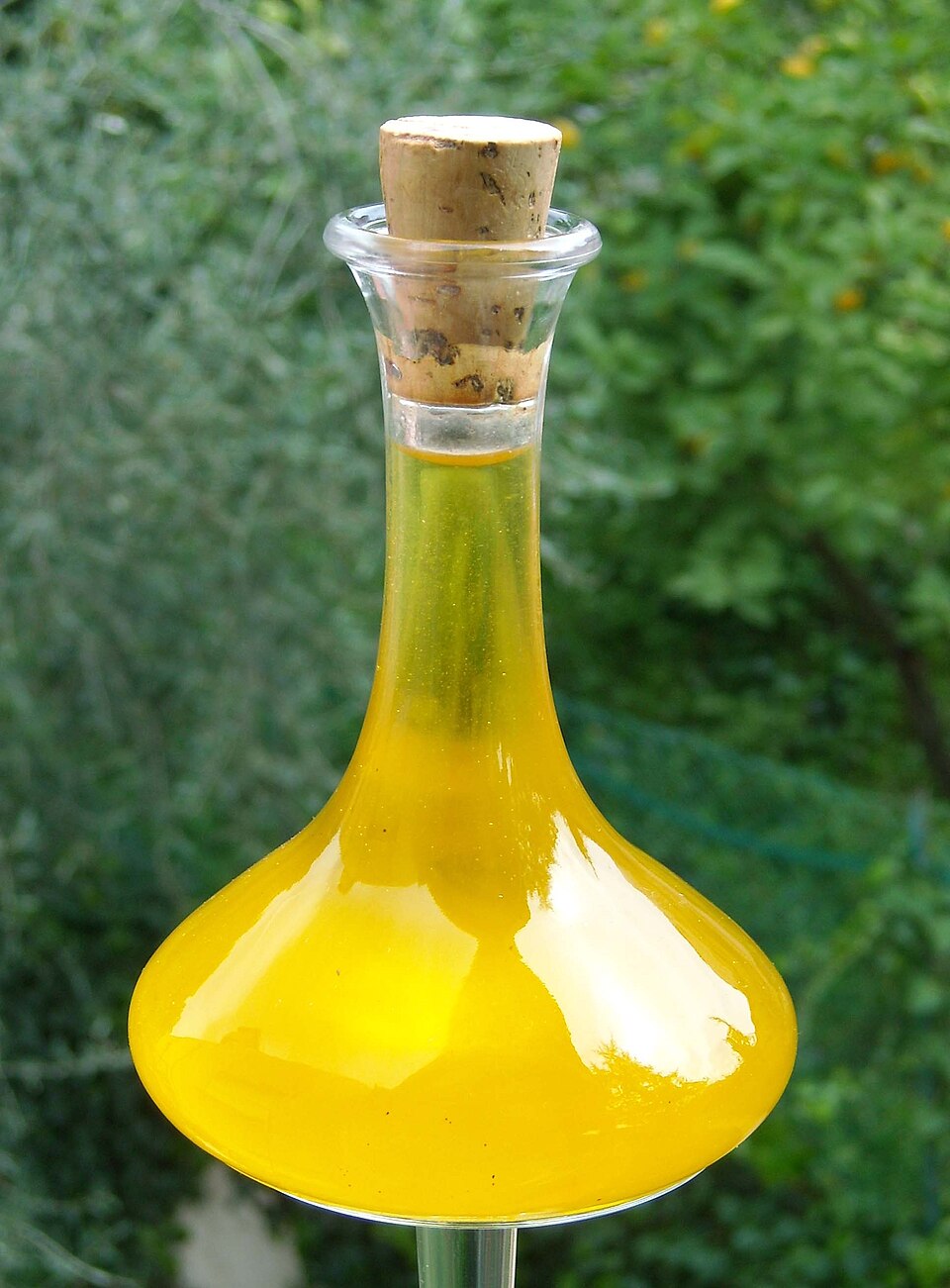 Greek extra virgin olive oil being poured
