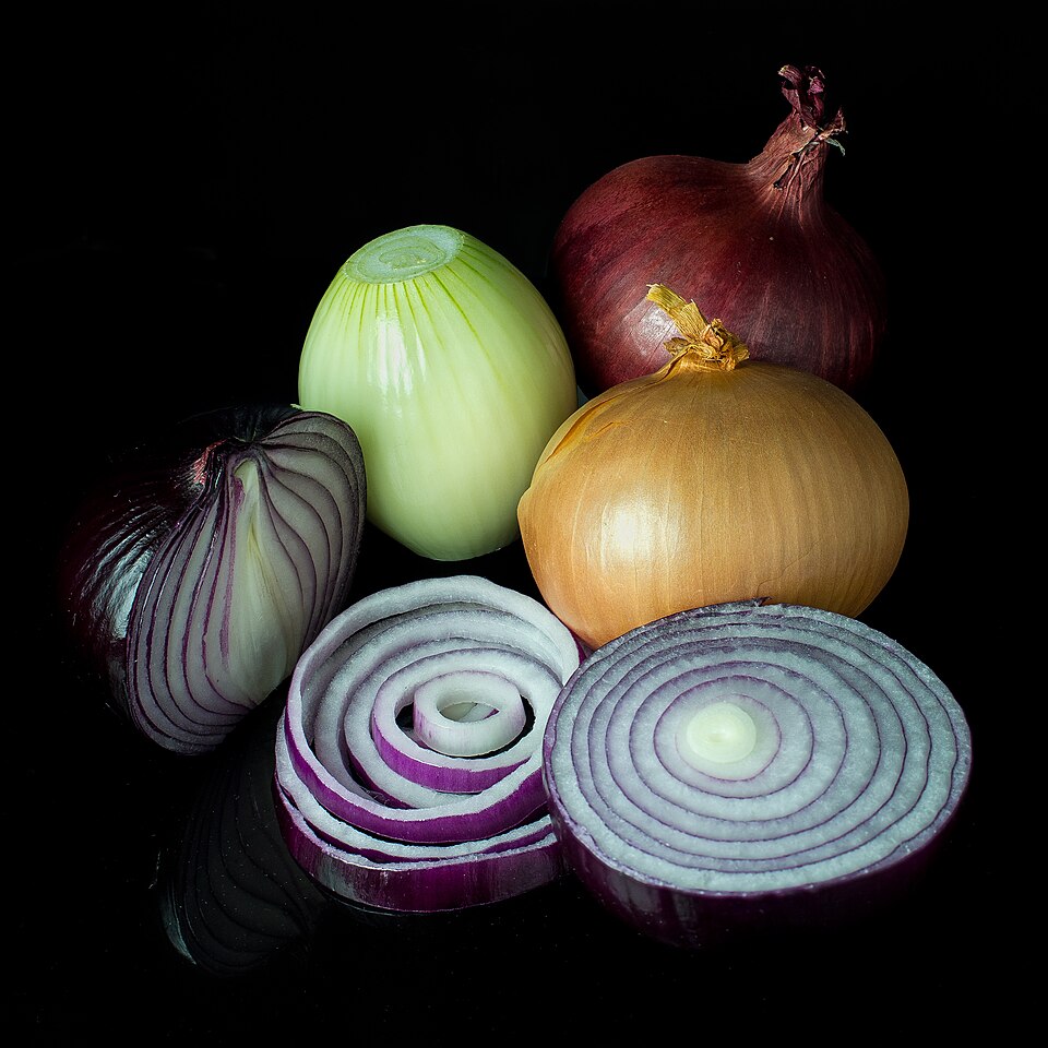 Onions, a foundational vegetable across Greek cooking