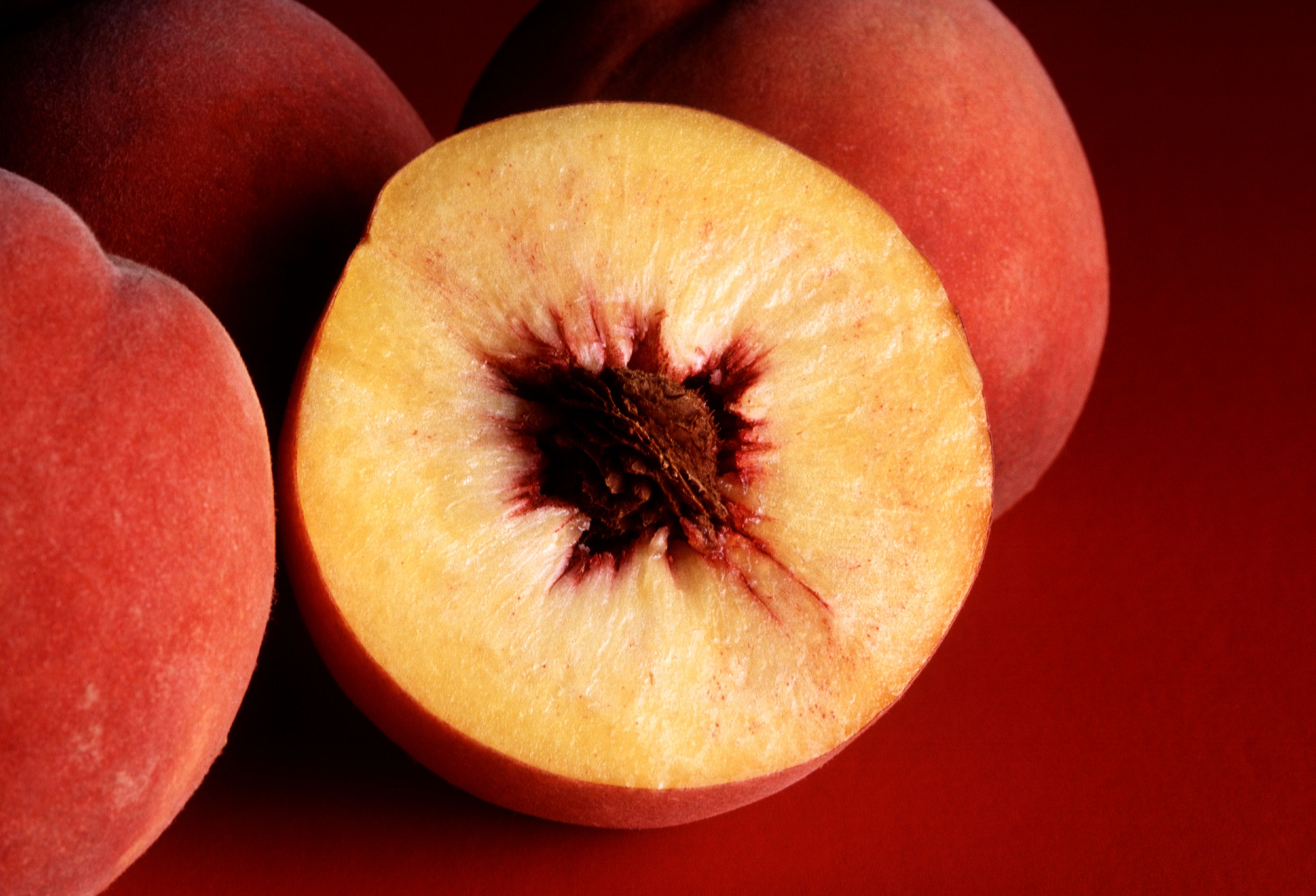 Ripe Greek peaches, sliced for yogurt and honey