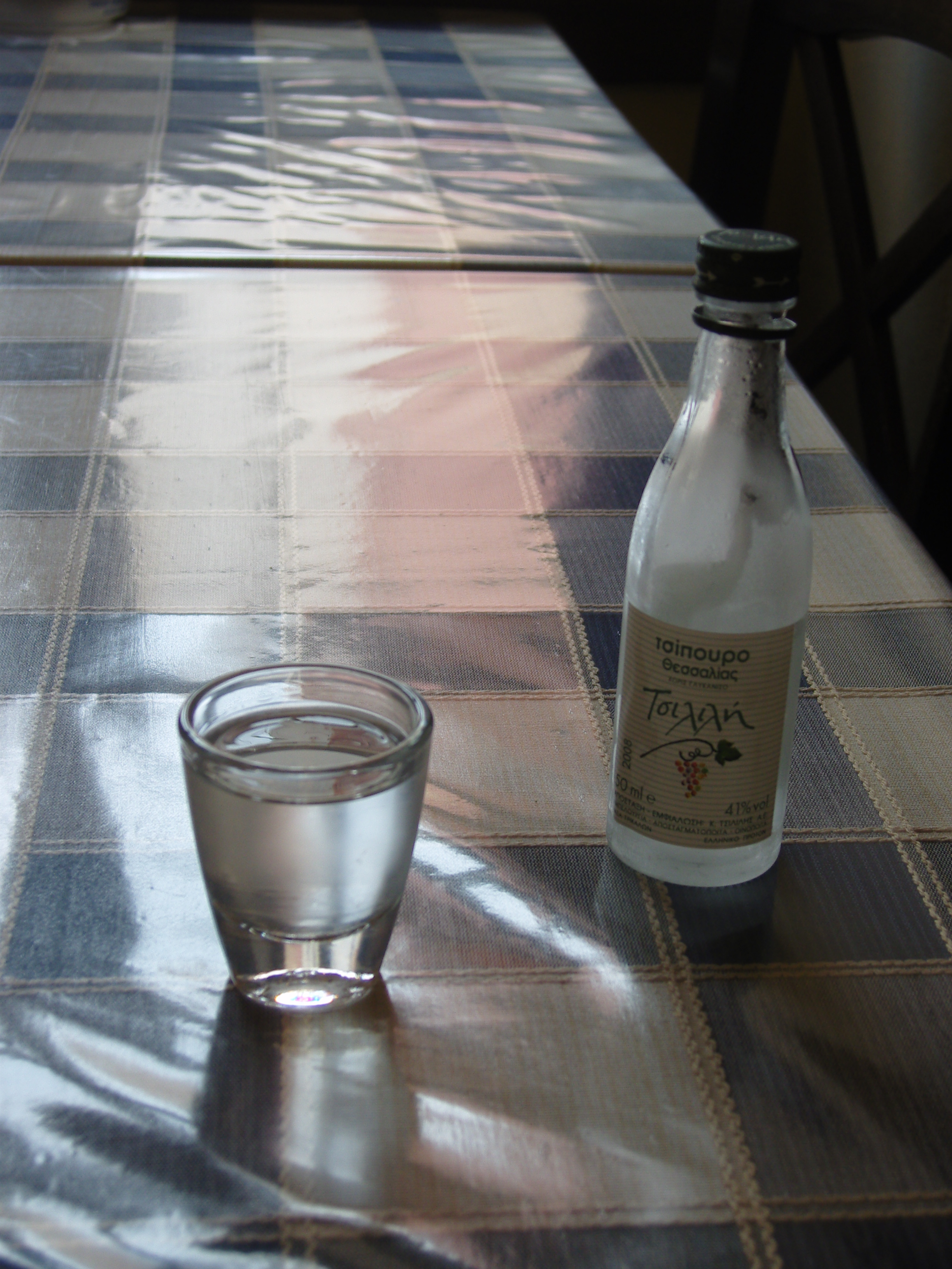A small glass of tsipouro, distilled after the grape harvest