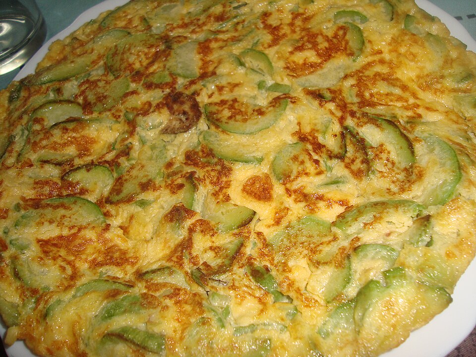 A slice of Kalymnos sfougato courgette and herb frittata