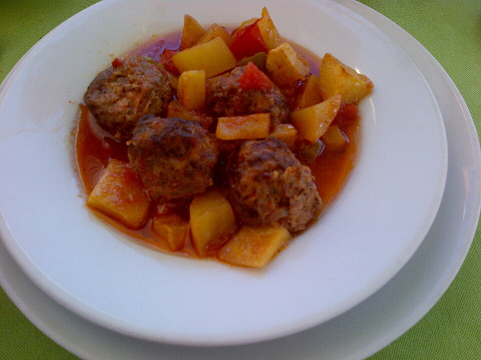Greek soutzoukakia oval meatballs in a rich tomato sauce