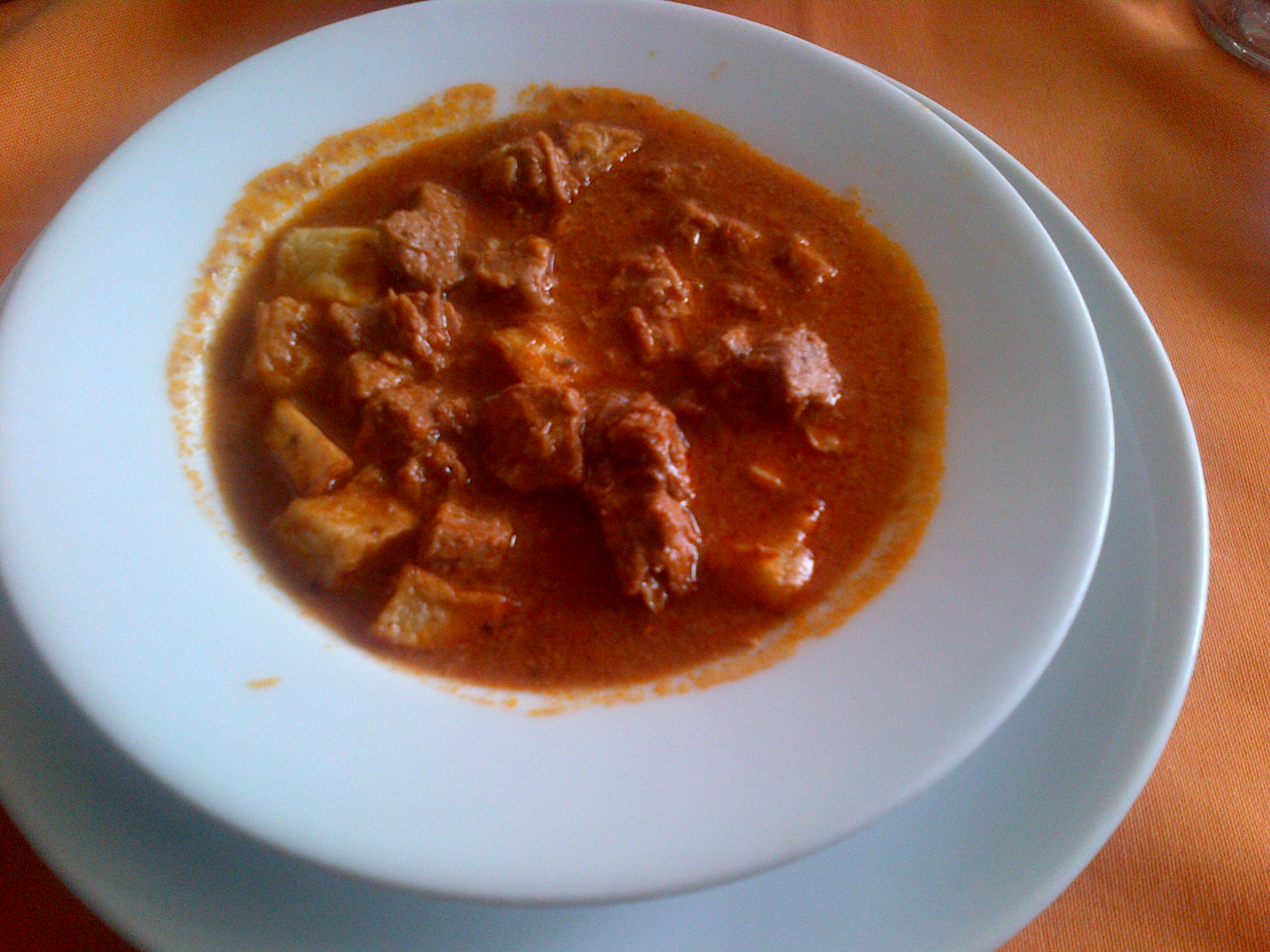 Greek tas kebap, spiced beef stew in a thin sauce served over rice